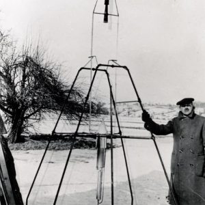 Dr. Robert Goddard stands next to his rocket on March 16, 1926, in Auburn, Massachusetts.